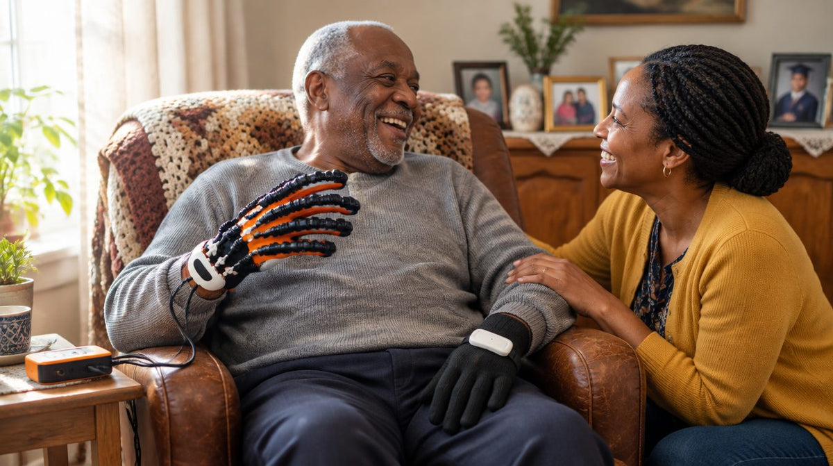 A father using the Mirra glove at home while his daughter smiles beside him